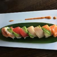 JR36. Rainbow Roll  · Includes 8 pieces. Tuna, shrimp, yellowtail, salmon, crab, avocado, and cucumber.