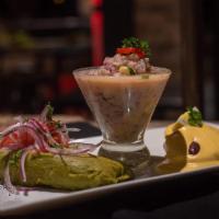 Piqueo Criollo · Appetizer sampler: chicken tamale, leche tigre, & Huancaina-style potatoes.