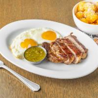 STEAK  &  EGGS · 7oz Sirloin with two eggs any style with tater tots, green sauce & toast.