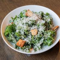 Kale Caesar Salad · Chipotle Caesar dressing, croutons and Parmesan cheese.