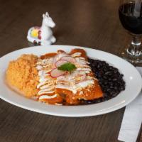 Chicken Enchilada · Served with rice beans, sour cream, fresh cheese and red onion.