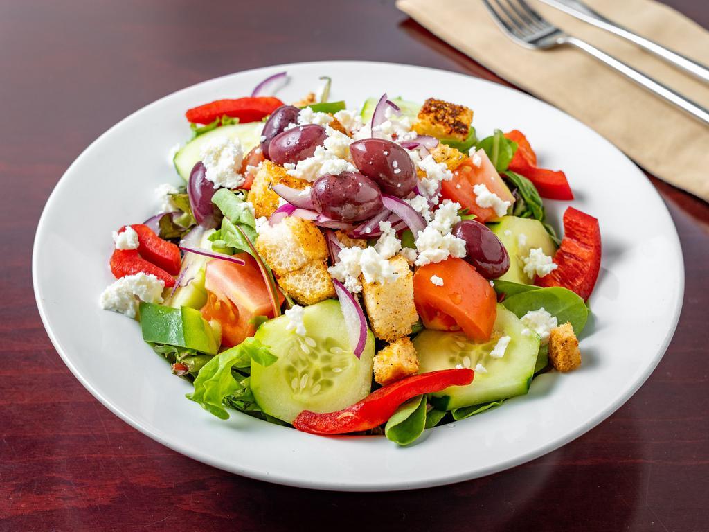 Greek Salad · Fresh mesclun, tomato, cucumber, Kalamata olives, sweet red onion, and imported feta cheese.