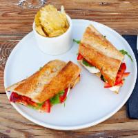 The Vegan Sandwich  · Kustaa Hummus, Organic Tomatoes, Cucumber, Radish and Mixed Greens