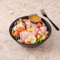 Antipasto Salad · House salad with ham, salami, pepperoni, provolone cheese and peppers.