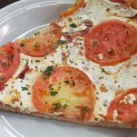 Margarita Pizza · Fresh mozzarella, plum tomato, and fresh basil.