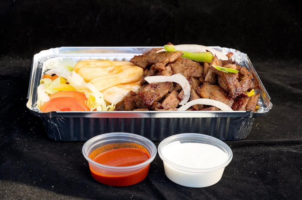 Lamb Over Rice Platter · Served with rice, lamb, mixed salad, fries, and jalapeno pepper hot sauce-white sauce.