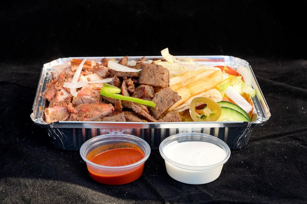 Mix Over Rice Platter · Served with rice, chicken, lamb, mixed salad, fries, and jalapeno pepper hot sauce-white sauce.