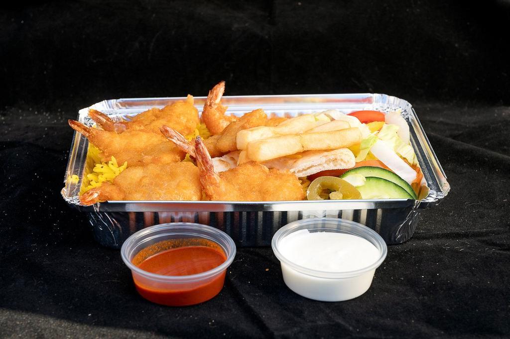 Shrimp Over Rice Platter · Served with rice, shrimp, mixed salad, fries, and jalapeno pepper white sauce.