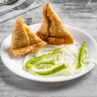 1. Vegetable Samosa · 2 pieces. Dumpling stuffed with potatoes and fresh peas (deep fired).