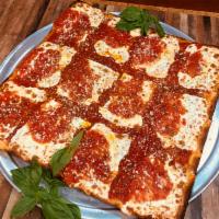 Grandma Pizza · 12 slices. Made with fresh mozzarella.