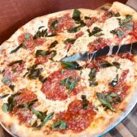 Margherita Pizza · Made with fresh mozzarella.