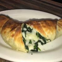 Spinach Roll · Pizza dough rolled with spinach, mozzarella cheese and ricotta cheese.