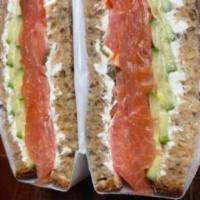 NORWEGIAN SMOKED SALMON SANDWICH · w/ tomato, cucumber, capers and cream cheese on seeded bread
