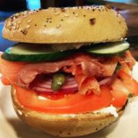 NOVA SALMON BAGEL · Red onions, capers, tomatoes and cucumber, cream cheese