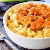 Buffalo Mac N Cheese  · Our famous mac n cheese baked with chicken tenders and buffalo sauce 