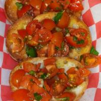 Classic Bruschetta · 3 toasted slices of bread topped with tomatoes, garlic, basil, olive oil and balsamic vinega...