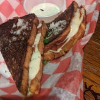Pepperoni Grilled Cheese · A grilled cheese sandwich with pepperoni and provolone on sour dough bread seared with Parme...