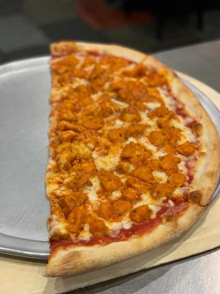 Buffalo Chicken slice · Chicken cooked in Tommy’s own spicy creamy Buffalo sauce topped with mozzarella
