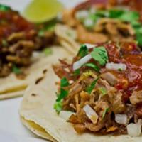 Tacos · Traditional Street Tacos with choice of protein, onions, cilantro and choice of Salsa