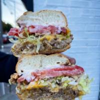 Chopped Cheese · Chopped Angus Patty, Lettuce, Tomato, American Cheese, and Mayo. 

Severed on a Toasted Semo...