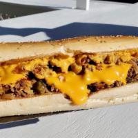 Wit Whiz Philly Cheesesteak · Chopped Steak, Cheese Whiz, Diced Caramelized Onions.
Served on a Toasted Seeded Semolina Hero