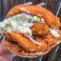 The Izzy · Fried Chicken Tossed in Mike’s Hot Honey® topped with House Coleslaw.
Served on a Toasted Br...