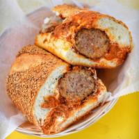 Vodka Meatball Parm · Meatballs, Melted Sharp Provolone, House Vodka Sauce, Oregano, and Ricotta Spread.
Served on...