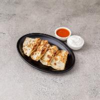Q2. Monterey Jack Cheese and Chicken Quesadilla · Made with 2 fresh flour tortillas and melted cheese.