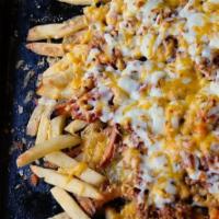 Pancho Fries · French Fries, Sour Cream, Crispy Bacon, Melted Mozzarella & Ranch Dressing