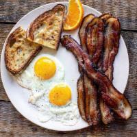 Eggs Any Style · Two eggs, bacon, sausage & toast