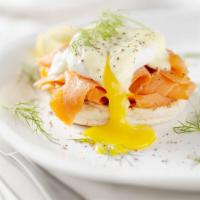 Salmon Benedict · English muffin, poached egg, smoked salmon & maple hollandaise over mixed greens or potatoes