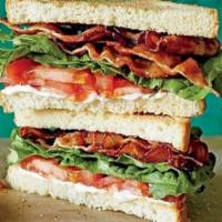 BLT Texas Toast · Sliced Texas Toast, Bacon, Lettuce, Tomato, Onion, & Mayonaise with Fries and Pickles