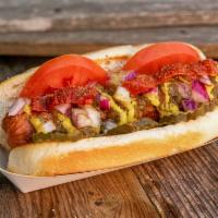 Chicago Dog · Dill pickles, tomato's, sweet relish, yellow mustard, red onion, Mama Lil's peppers, and a d...