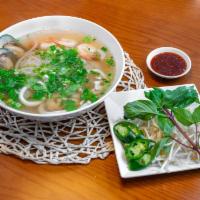 P10. Seafood Pho · Shrimp, squid, and mussel.