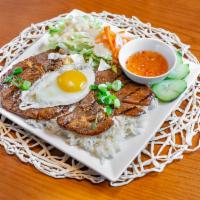 R1. Grilled Pork Chop Rice Dish · Serve with salad, cucumber, pickle, with house fish sauce.