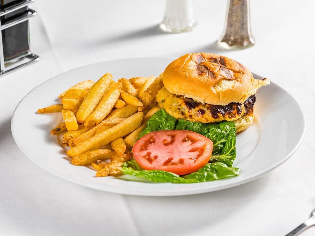 Barosa Burger with fries · Hundred percent black Angus beef.