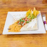 Quesadilla Tex Mex · Flour tortilla, lettuce, grilled chicken, or steak. Served w/rice, guacamole, pico de gallo,...