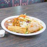 Mexican Combo · 2 Flautas, ground beef taco, enchilada, chile relleno, rice and beans.