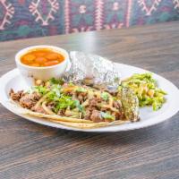 Alambre Tacos · Steak, bacon, and long green Chile. Includes baked potato, charro beans and guacamole.