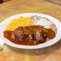 Mole Poblano  · Served with rice, beans, Mexican cheese.
