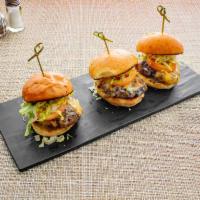 59 Beef Sliders · Angus beef sliders served on a brioche bun, with mozzarella, lettuce, tomatoes and onions to...