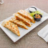 Quesadilla Tres Quesos · Mozzarella, Jack cheese and cheddar cheese served with Pico de gallo, sour cream and guacamo...