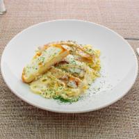 Fettuccini Alfredo · Fettuccini with parsley, Parmesan cheese; mozzarella cheese and Alfredo sauce. Add protein f...