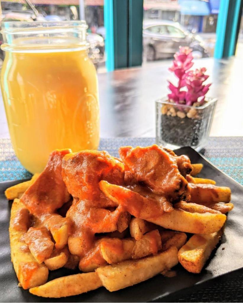 Shhh... Private Menu: Masala Fries Smothered with Chicken Tikka Masala (12oz) · Twice cooked fries tossed with spices and topped with a healthy serving of spicy chicken tikka masala and pickled onions. We send you everything separately, no one wants soggy fries when they open the container.