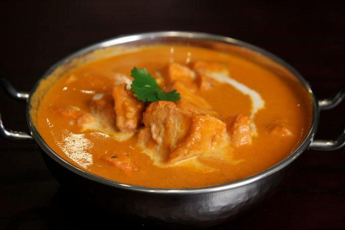 Chicken Tikka Masala · Tandoori chicken tikka in mild creamy tomato sauce. Served with rice.