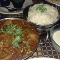 Lamb Kadai · Lamb cooked with tomatoes, onions and fresh assorted vegetables. Served with rice.