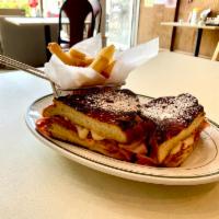 Monte Cristo · Ham and melted Swiss on french toast. Served with  Steak Fries