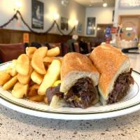 Philly Cheese Steak Wedge · Served with french fries
