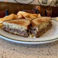 Patti's Melt Burger · Served with Swiss and American on grilled rye and fries.