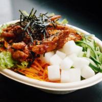 Spicy Gochujang Chicken Bowl · Gochujang chicken, carrots, pickled radish, perilla leaf, red leaf lettuce, cucumbers, sesam...